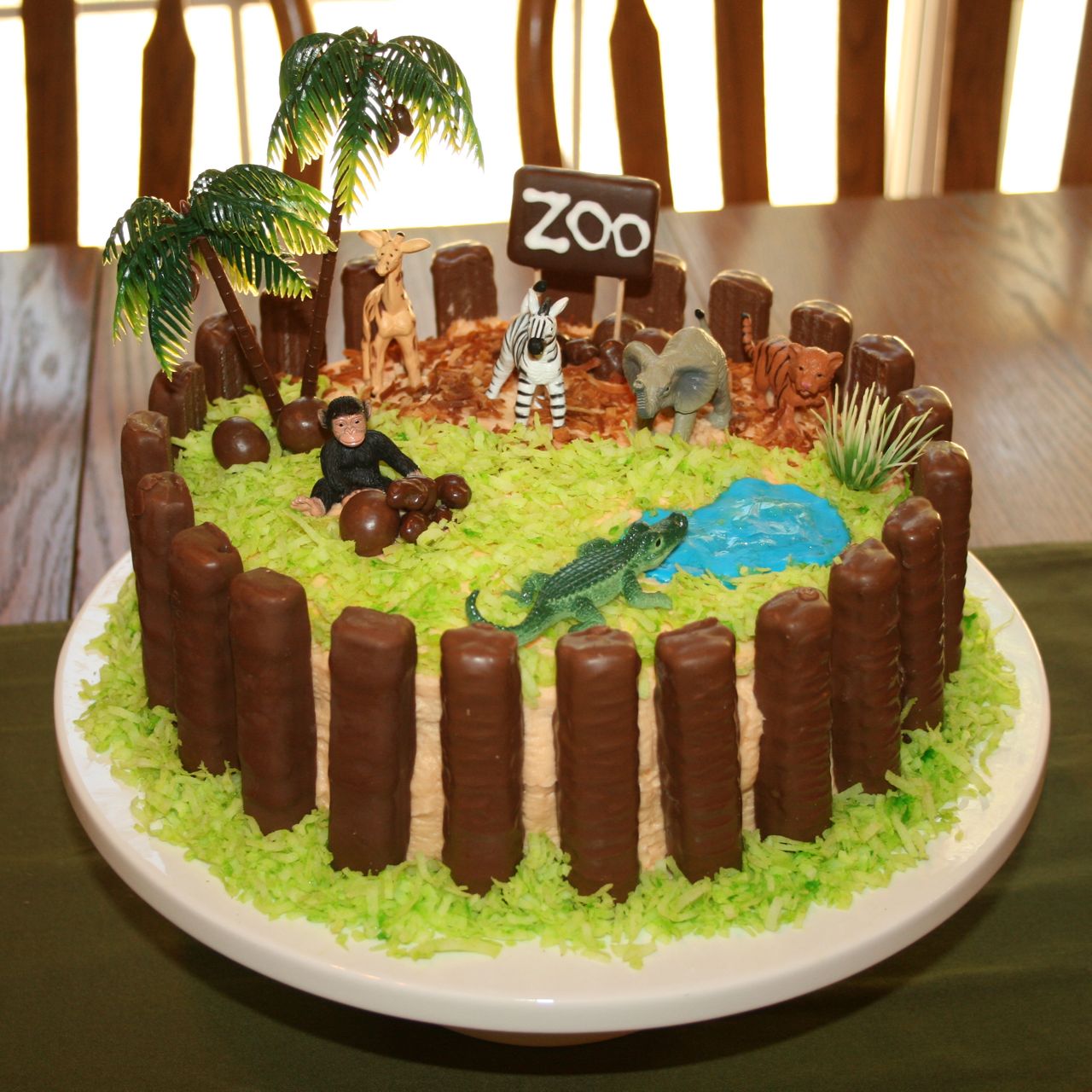 Baby Zoo Animals Birthday Cake - CakeCentral.com