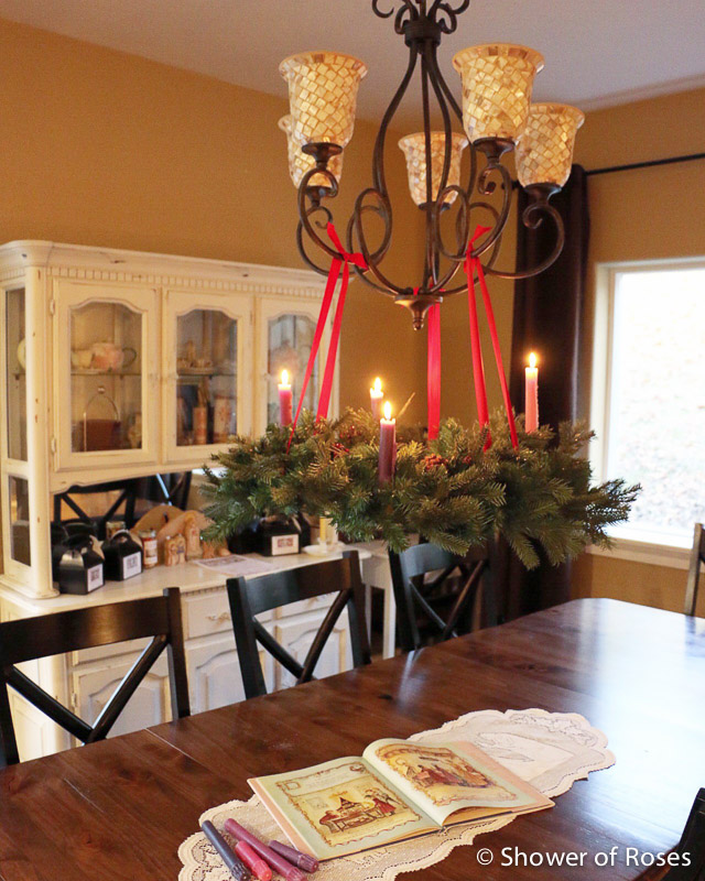 A hanging Advent Wreath with Candle Holders from Bonsai Wire